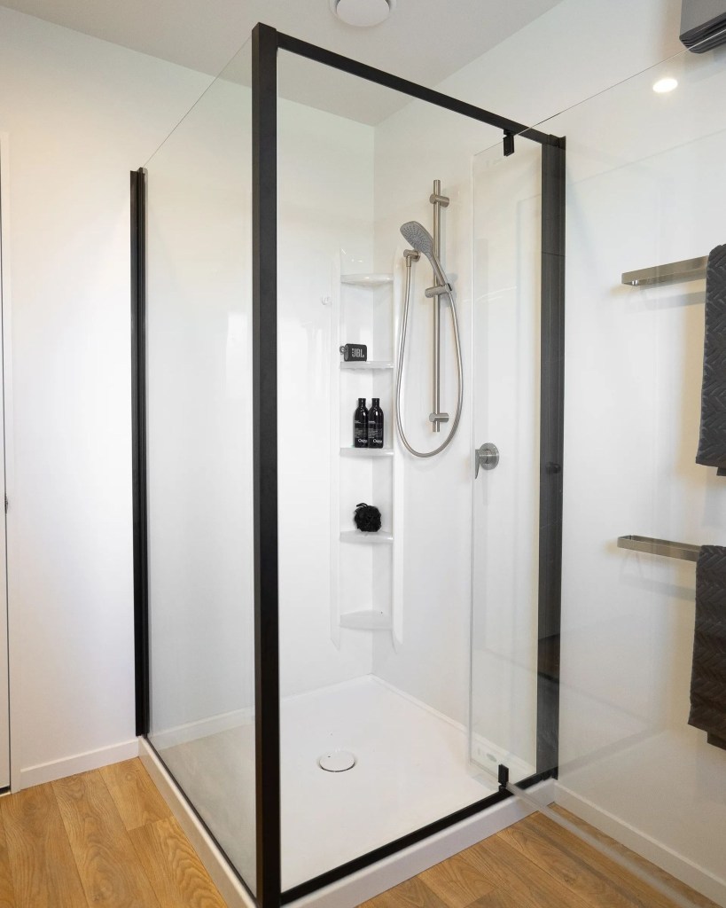 Acrylic shower panels with matching base for grout-free bathroom