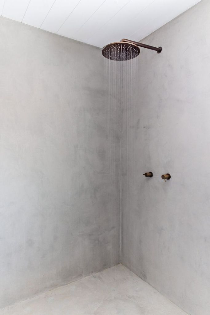 Microcement bathroom wall alternative for seamless, grout-free finish