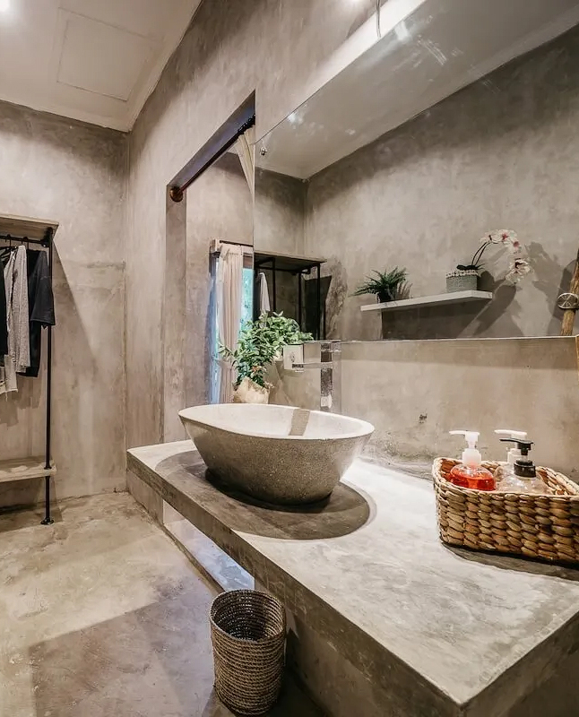 Polished concrete bathroom wall with minimalist design