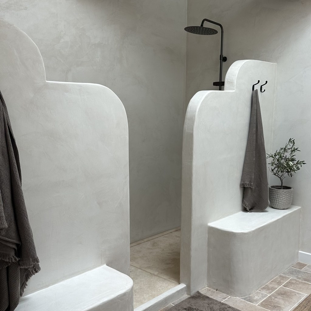 Polished concrete bathroom wall with minimalist design