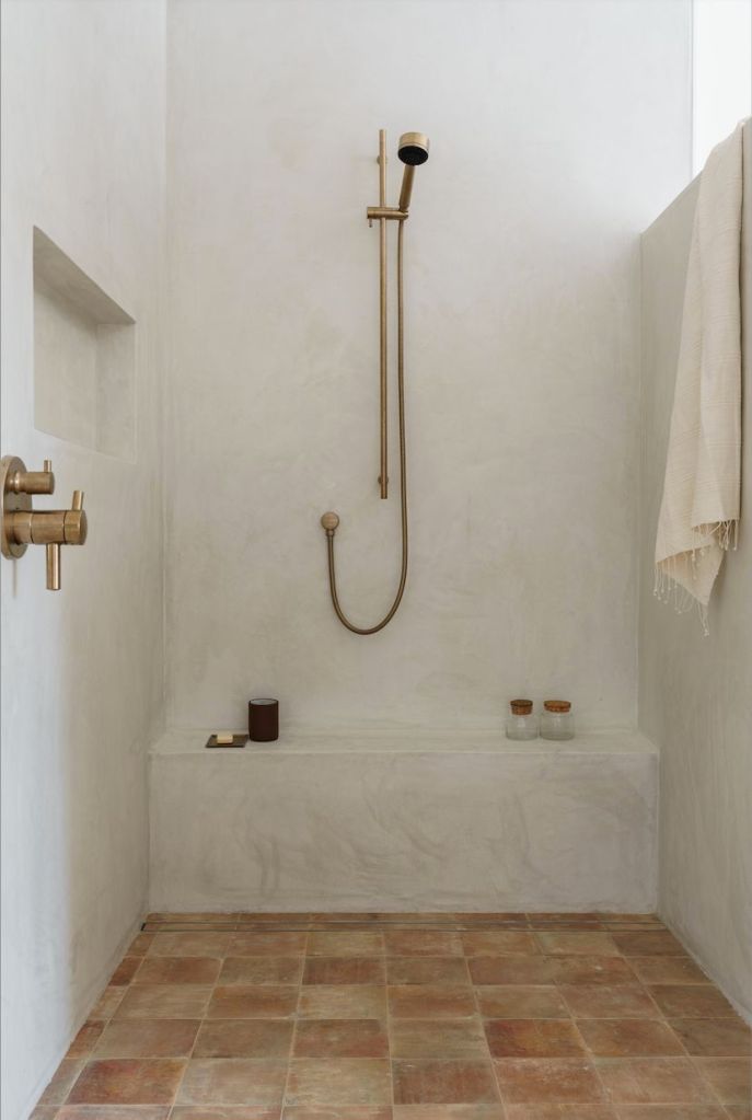Venetian plaster walls in a modern bathroom design