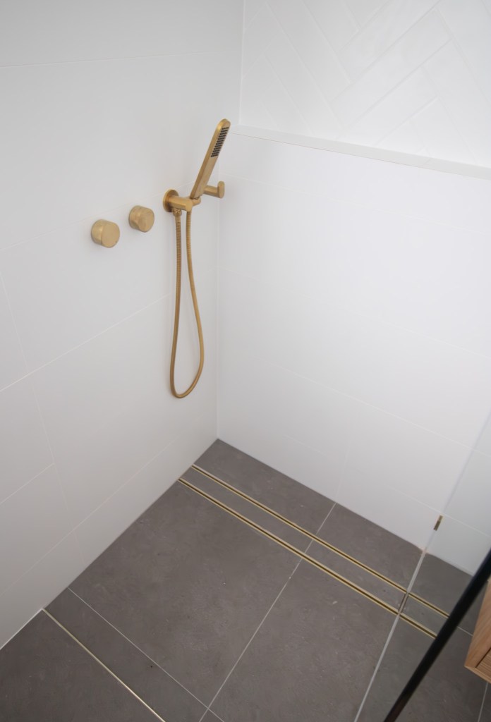 wall‑side linear shower drain