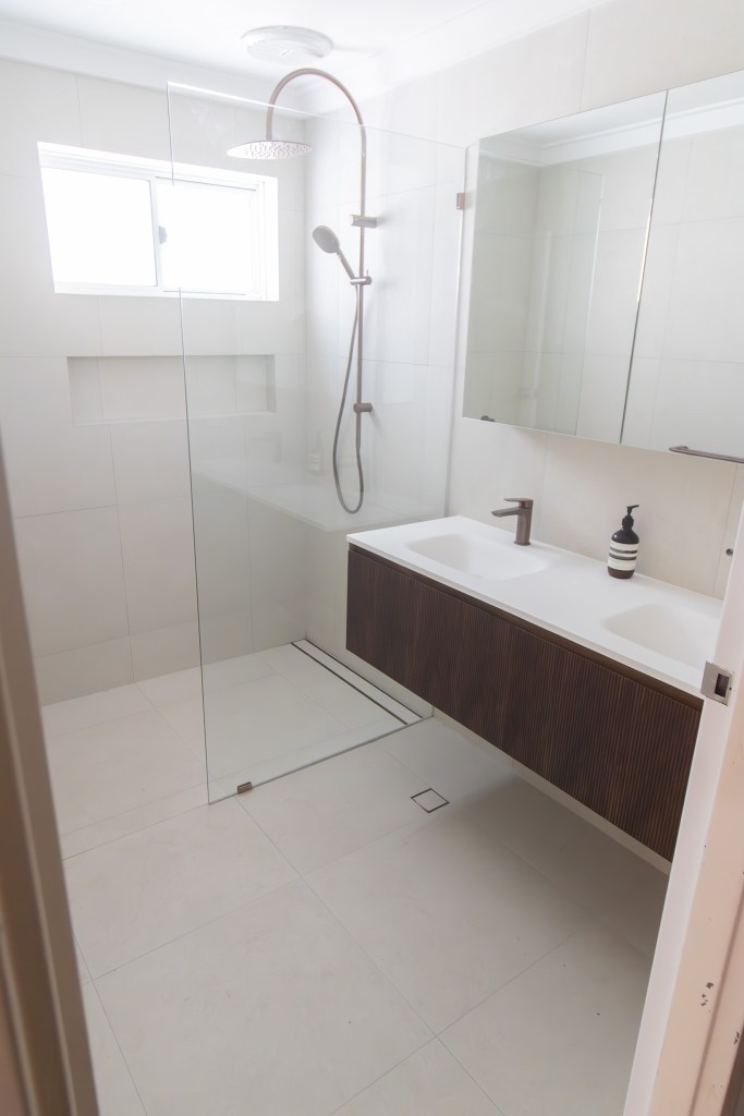 small bathroom layout with walk in shower and floating vanity Australia